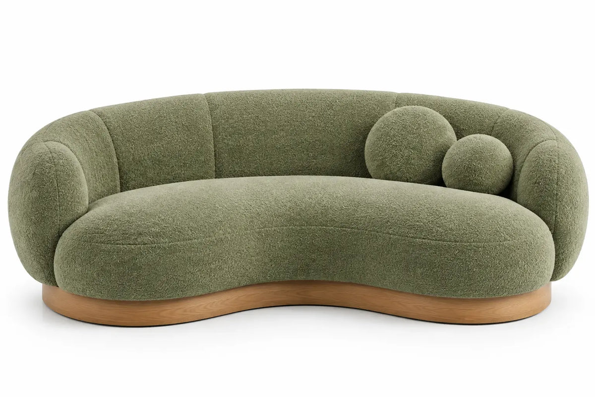 Sofá curvo tapizado de contorno redondeado, verde y marrón - hewnandharmonious
